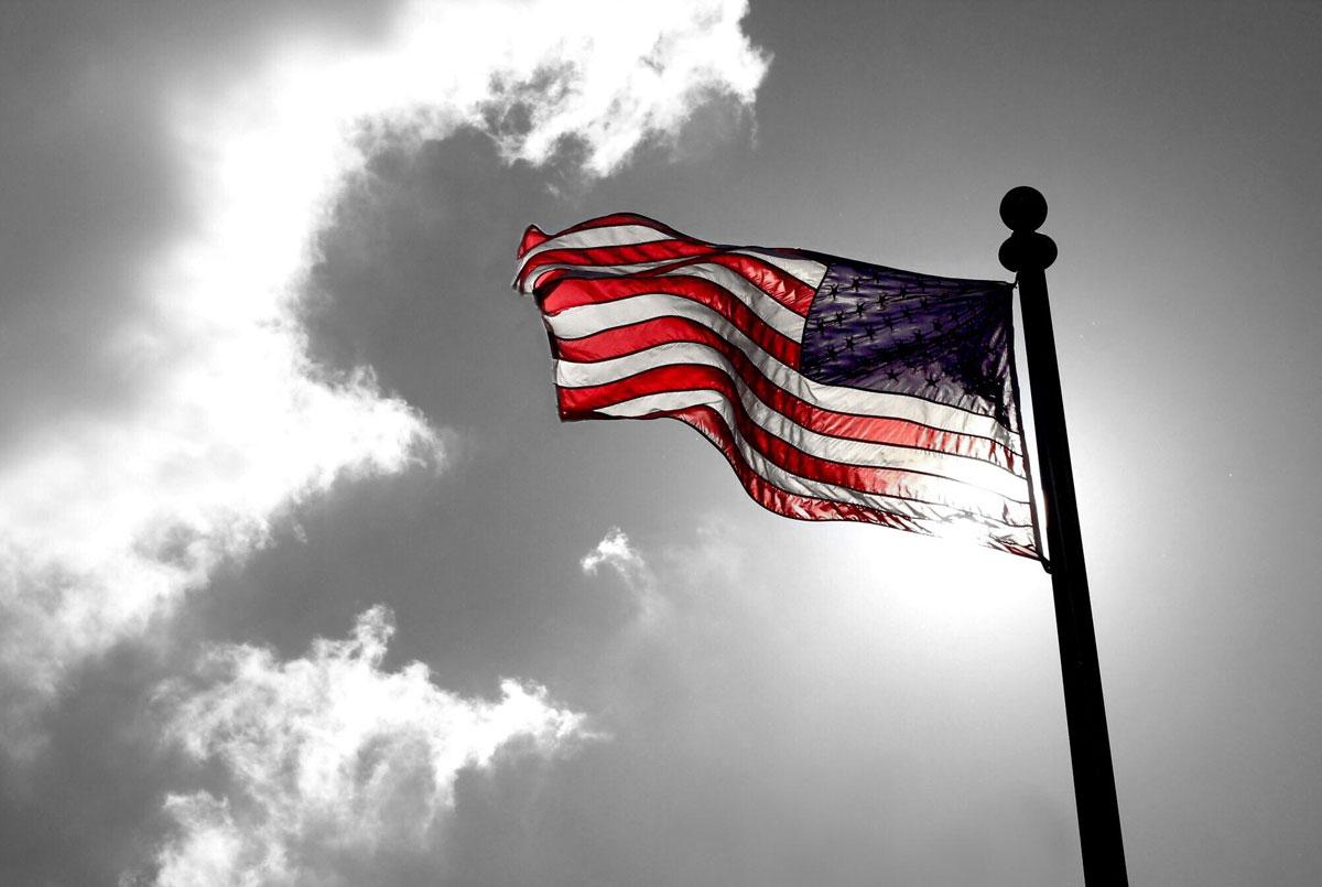 Flag in front of clouds